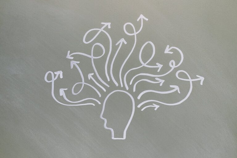 Illustration of multiple thought directions symbolizing cognitive processing and mental patterns in CBT and hypnotherapy for trauma recovery