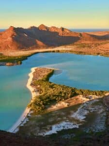 A scenic mountain landscape with greenery symbolizing calm, grounding, and connection to inner stability.