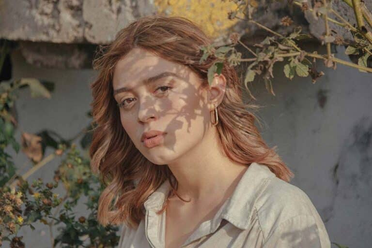 a woman with a face paint