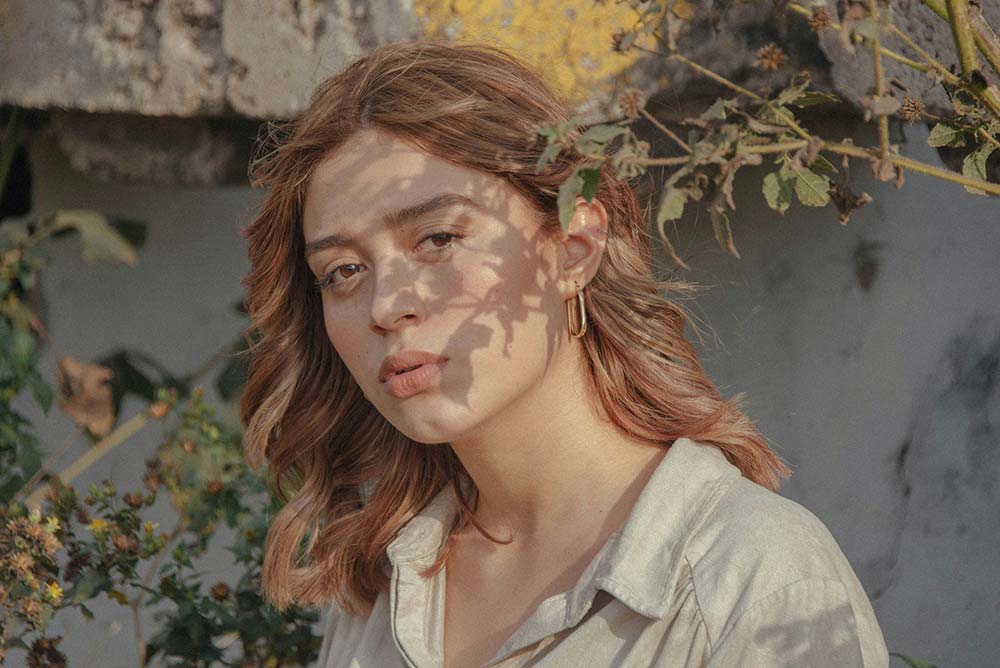 a woman with a face paint